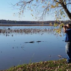 Harlan Jeglin enjoying the birds on a field trip.
